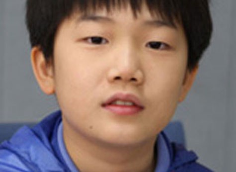 Cậu bé Seung-won vượt qua 3 kỳ thi của 3 cấp trong 1 năm - Ảnh: Chosun Ilbo